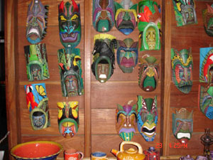 Boruca Indian masks displayed in the gallery.